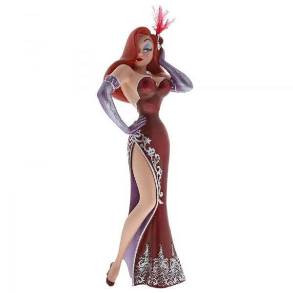 The Enesco Disney Showcase Jessica Rabbit Figurine (6002182) features the glamorous red-haired character in a strapless red gown with high slit, purple gloves, and feathered headpiece, striking a confident pose.