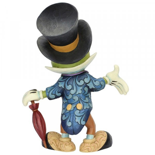 Disney Traditions Jiminy Cricket from Pinocchio looking dapper standing supported by his umbrella big figurine
