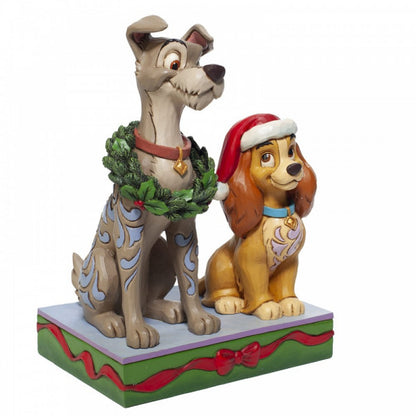 Disney Traditions Lady & the Tramp, Lady wears a Santa hat and Tramp a wreath Figurine