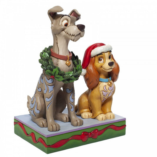 Disney Traditions Lady & the Tramp, Lady wears a Santa hat and Tramp a wreath Figurine