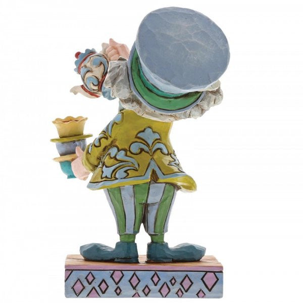 Disney Traditions Mad Hatter from Alice In Wonderland holding a teapot, cups and saucer ready for the tea party Figurine