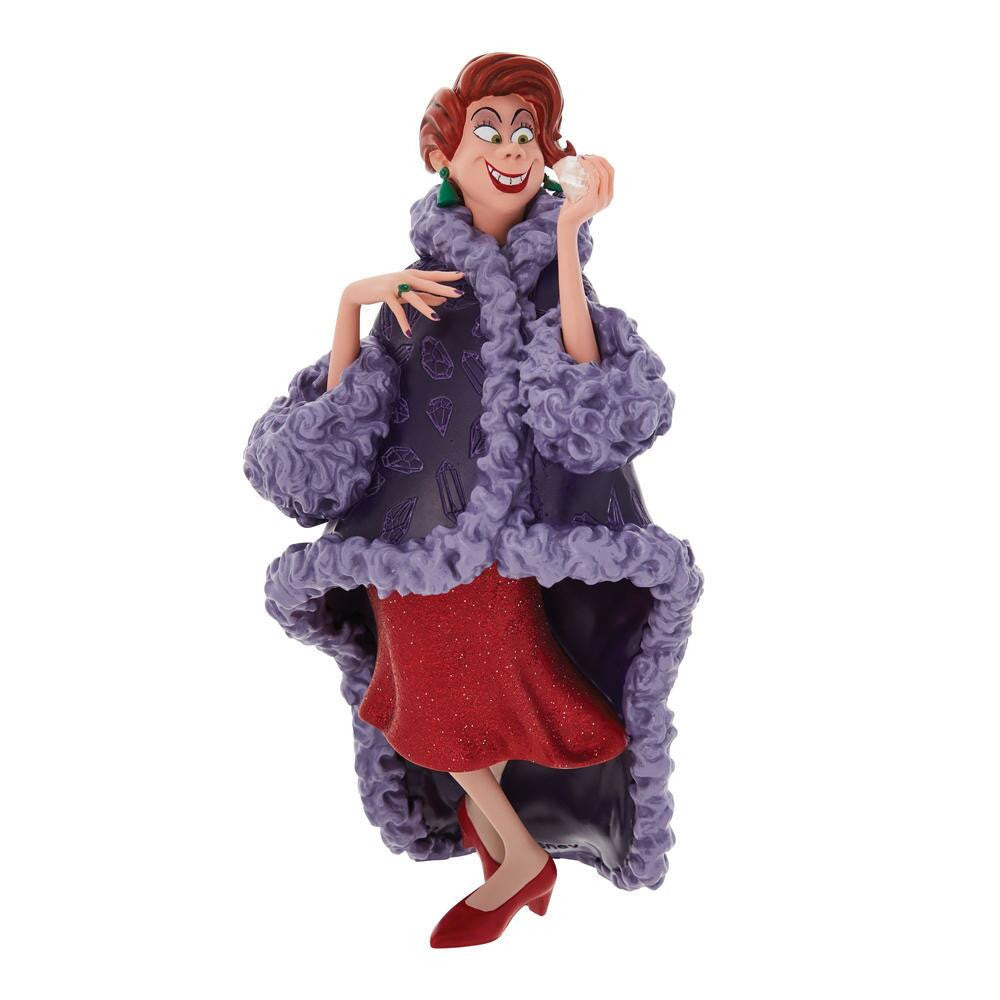 The Enesco Disney Showcase Madame Medusa Figurine 6010728 features a cartoon woman with short red hair in a long purple fur-trimmed coat, red sparkly dress, and red heels, showcasing her sly smile, green earrings, and iconic style from The Rescuers.