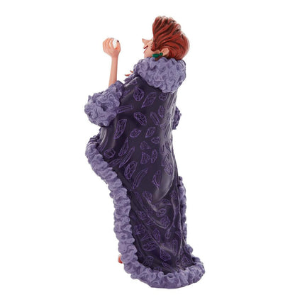 The Enesco Disney Showcase Madame Medusa Figurine 6010728 from The Rescuers features Medusa in a dark purple robe with lavender trim and crystal patterns, barefoot, looking up gracefully with one arm bent.