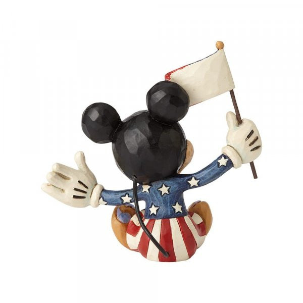 Disney Traditions Mickey Mouse in Patriotic dress waving the American Flag mini figurine