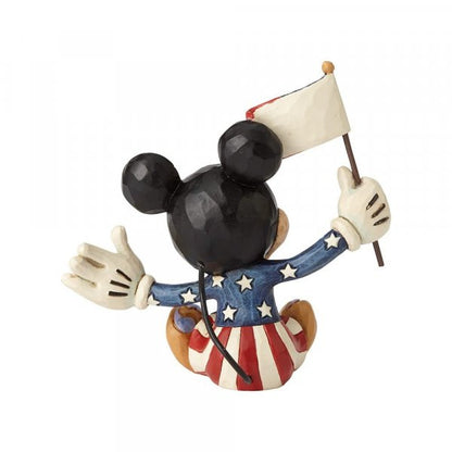 Disney Traditions Mickey Mouse in Patriotic dress waving the American Flag mini figurine