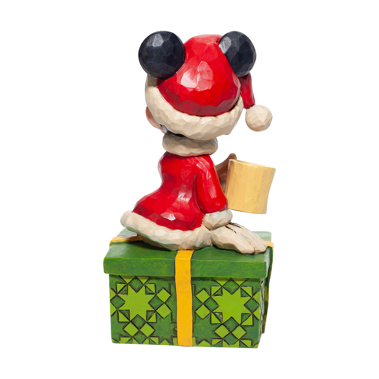 Disney Traditions Minnie Mouse sits on a present sipping hot chocolate figurine