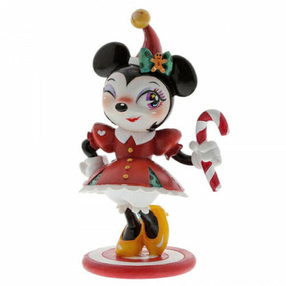 Disney Miss Mindy Minnie Mouse in her Christmas outfit, holding candy figurine
