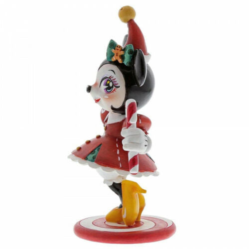 Disney Miss Mindy Minnie Mouse in her Christmas outfit, holding candy figurine