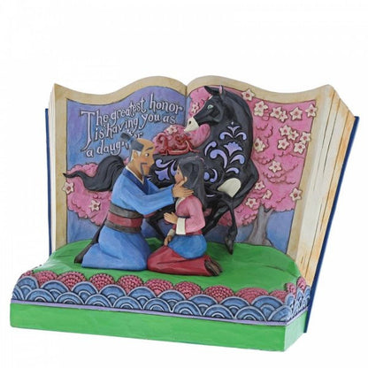 Disney Traditions Mulan and her father with Khan and Mushu on a storybook figurine.