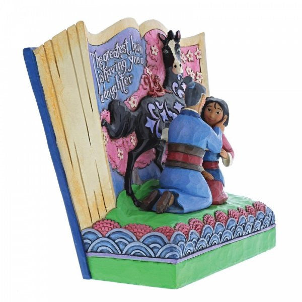 Disney Traditions Mulan and her father with Khan and Mushu on a storybook figurine.