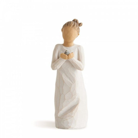 Willow Tree Figurine depicting a person holding a small bird