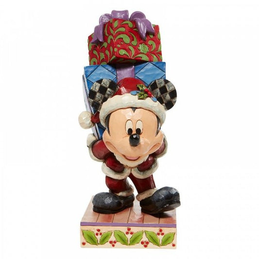 Disney Traditions Mickey Mouse dressed as Santa Claus and carrying a stack of presents Figurine