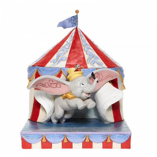 Disney Traditions Dumbo and Timothy Mouse flying past the circus tent figurine