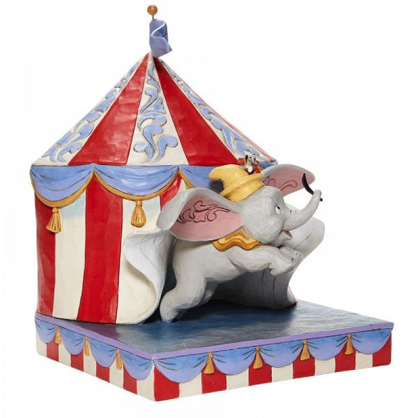 Disney Traditions Dumbo and Timothy Mouse flying past the circus tent figurine