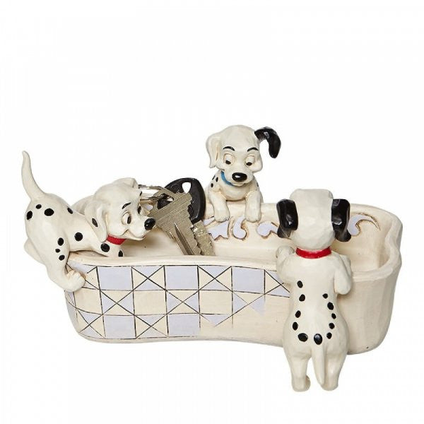 Disney Traditions Lucky and siblings are hunting for a treat or maybe somewhere to hide it in this bone-shaped dish figurine