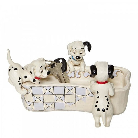 Disney Traditions Lucky and siblings are hunting for a treat or maybe somewhere to hide it in this bone-shaped dish figurine