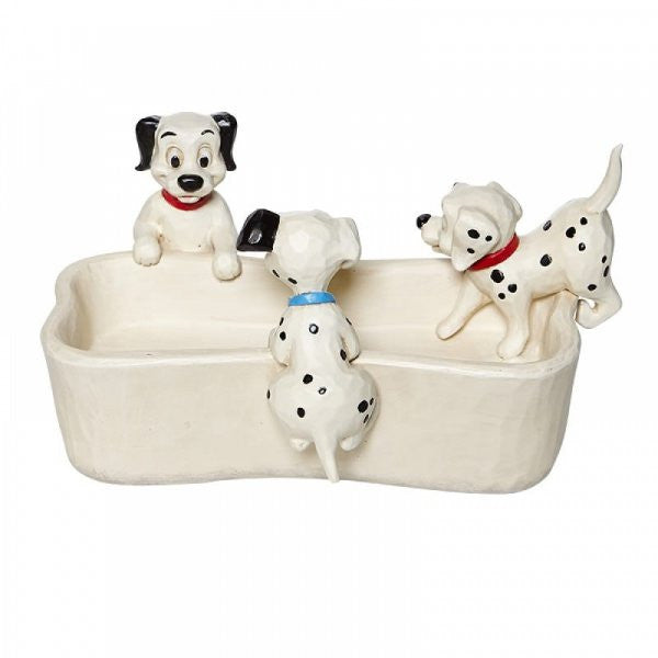Disney Traditions Lucky and siblings are hunting for a treat or maybe somewhere to hide it in this bone-shaped dish figurine