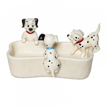 Disney Traditions Lucky and siblings are hunting for a treat or maybe somewhere to hide it in this bone-shaped dish figurine
