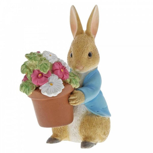 Beatrix potter Peter Rabbit always brings a great big pot of flowers figurine
