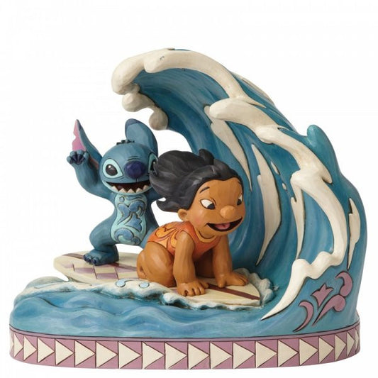 Disney Traditions Lilo and Stitch Surfing on a big wave figurine