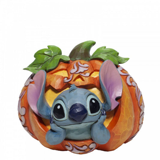 Disney Traditions Stitch, the alien from Lilo & Stitch inside a Pumpkin Figurine