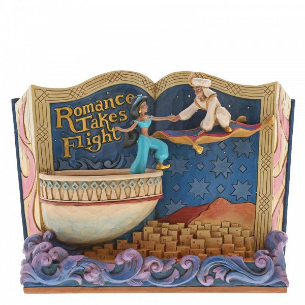 Disney Traditions Aladdin invites Jasmine to join him on the magic carpet on a Storybook figurine