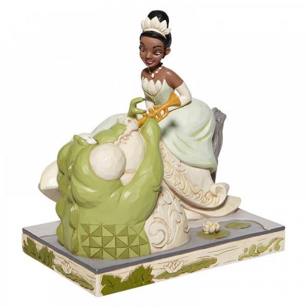 Disney Traditions Princess Tiana on lily pads while Louie serenades her with his trumpet figurine
