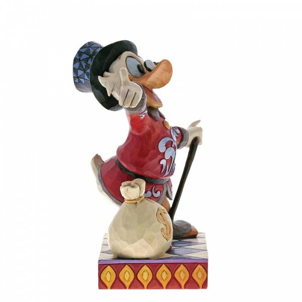 Disney Traditions Uncle Scrooge with a bag of money figurine