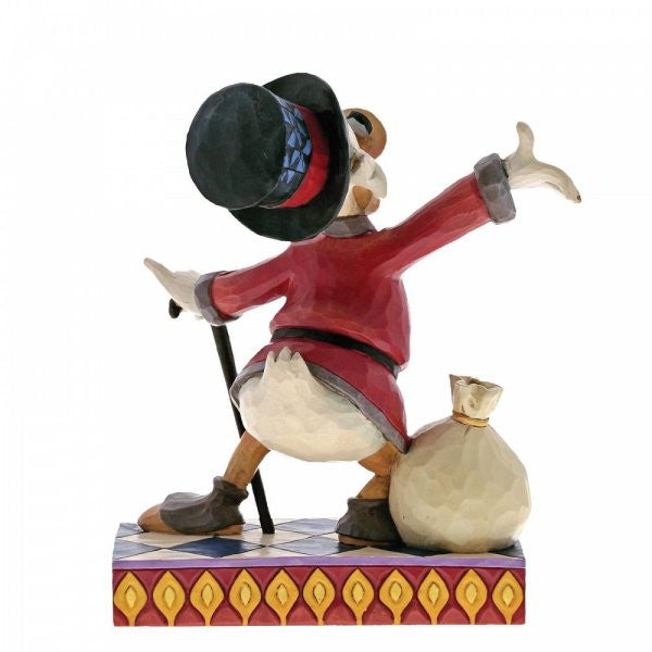 Disney Traditions Uncle Scrooge with a bag of money figurine