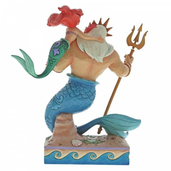 Disney traditions Ariel (The Little Mermaid) places a flower in father Triton's hair. Triton stands on his tail with gold trident in hand figurine4059730