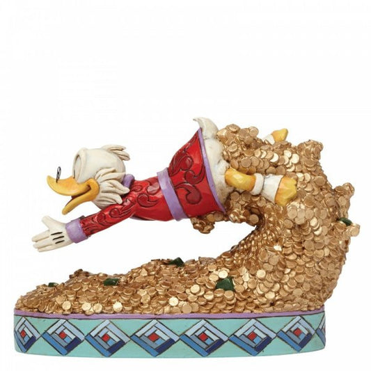Disney Traditions Uncle Scrooge diving into a pile of money figurine