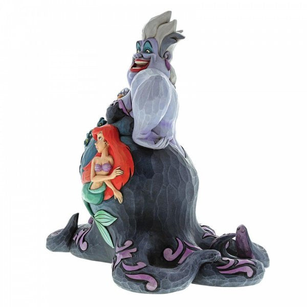 Disney Traditions Ursula and her evil side-kick eels, Flotsam and Jetsam with relief artwork depicting Ariel (The Little Mermaid) on her body Figurine