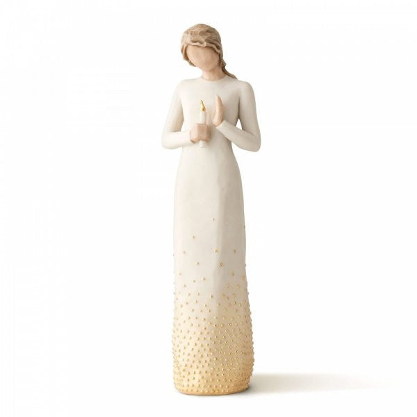 The Willow Tree Vigil Figurine by Willow Tree features a faceless woman in a long white dress with gold accents, holding a small candle. This elegant figurine is a touching sympathy gift for remembrance and healing.