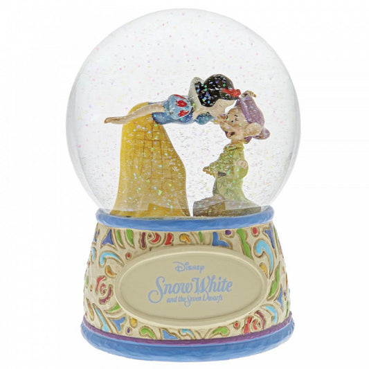 Disney Traditions Snow White kissing Dopey in a waterball figurine