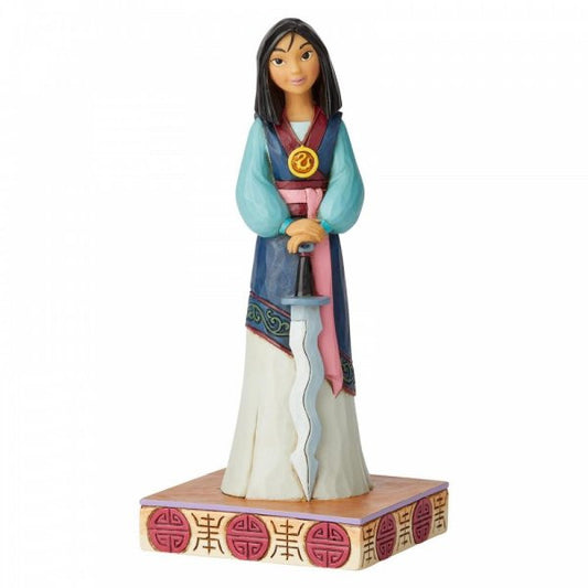 Disney Traditions Mulan holds Shan Yu's sword and wears the Emperor's crest figurine