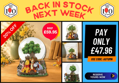 Promotional banner for a Winnie the Pooh snow globe figurine. The left side shows the product on a tabletop with a plate, books, and flowers, with text overlays including '20% OFF', 'RRP £59.