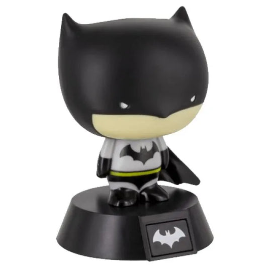 The Batman Icon Light by Paladone is a chibi-style collectible featuring Batman with a large head, black mask, cape, gray suit with bat symbol, and stands on a round black base with bat logo—ideal for any collection.