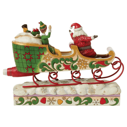 Buddy Elf and Santa Spreading Christmas Cheer (Sleigh Figurine) By Jim Shore 6013938