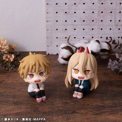The Bandai Namco Chainsaw Man Look Up Figure Denji & Power Limited Edition features two chibi-style PVC statues with unique blond hairstyles and fangs, displayed on a wooden surface—ideal for any Chainsaw Man fan.