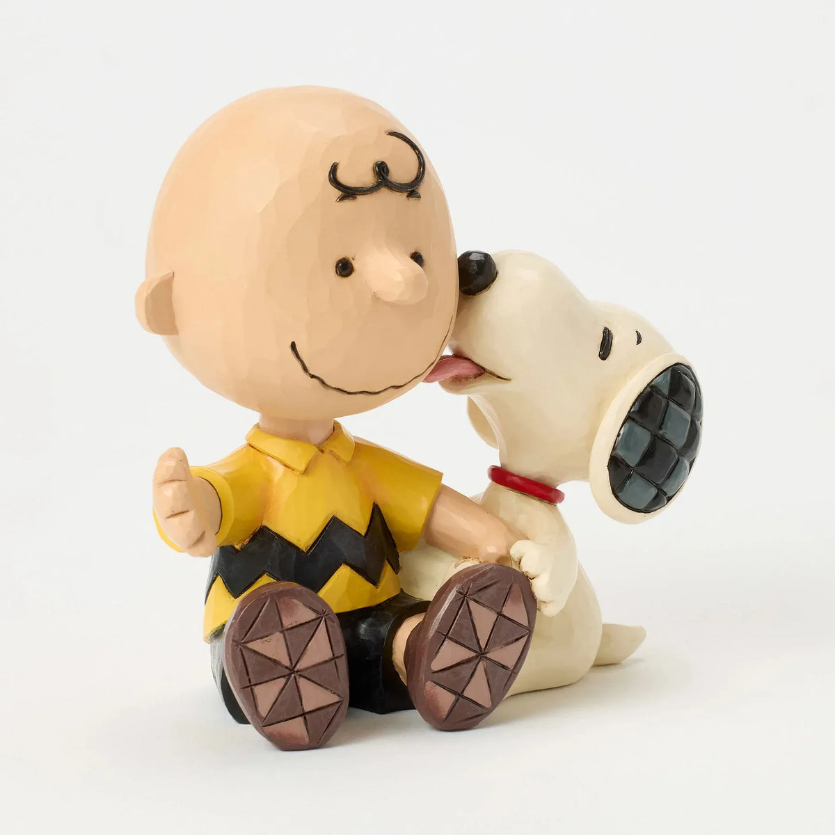 Charlie Brown with Snoopy Figurine Peanuts By Jim Shore