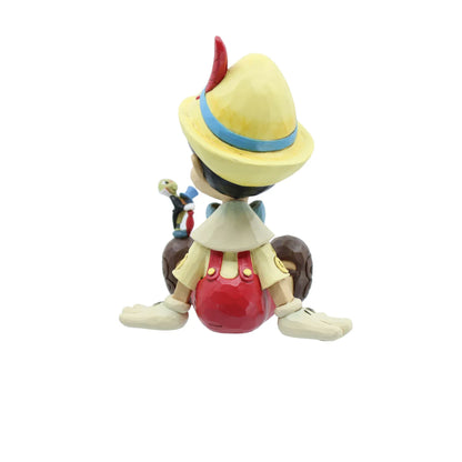 Disney Traditions Wishful and Wise Pinocchio and Jiminy Sitting Figurine By Jim Shore 6011934