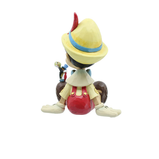 Disney Traditions Wishful and Wise Pinocchio and Jiminy Sitting Figurine By Jim Shore 6011934