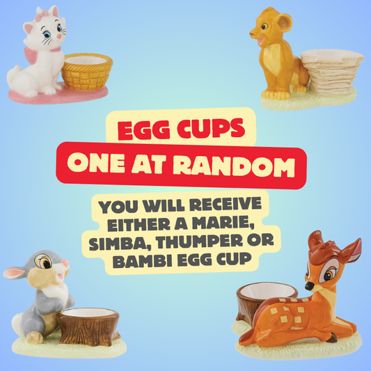 Disney Enchanting Egg Cup One at Random: Receive a randomly selected egg cup—Marie, Simba, Thumper, or Bambi—from the Disney Enchanting Collection. Blue background.