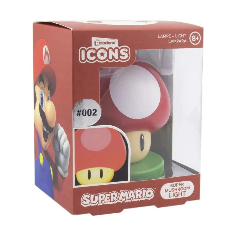 A boxed Super Mario Bros. Super Mushroom Light by Paladone, featuring a red and white mushroom design, is visible through the packaging window. The red box includes an image of Mario and product details—ideal for retro gaming fans.