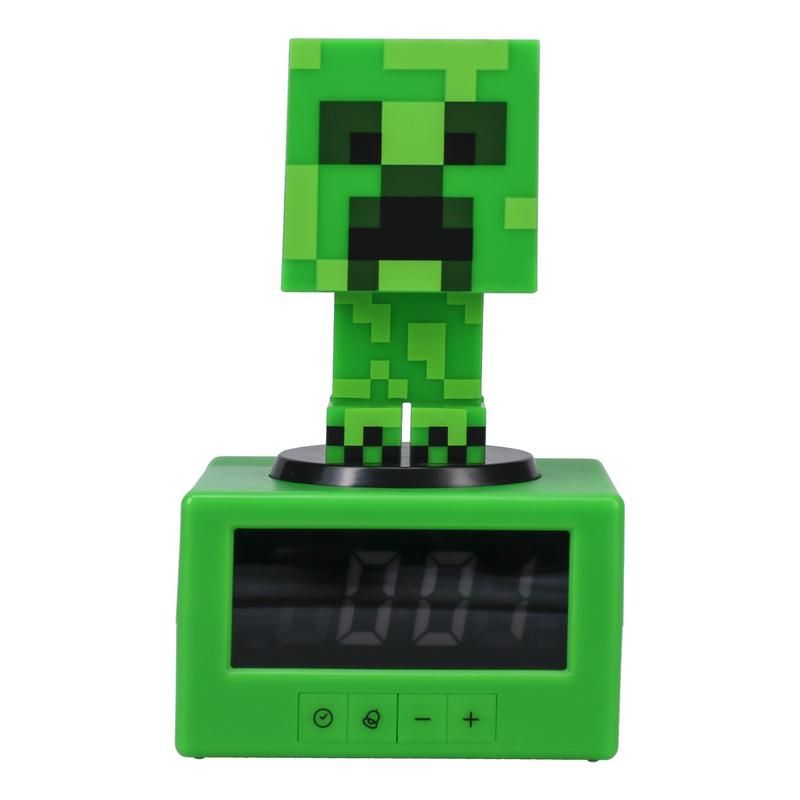 The Minecraft Creeper Icon Alarm Clock by Paladone features a green casing and pixelated Creeper icon on top. Its display reads 0:01, making it the perfect fun alarm clock for any gamer’s bedroom.