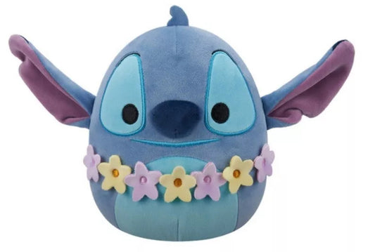 The Squishmallows 10 Disney Stitch Wearing Lei Flower Garland plush features big blue ears, a light blue face, and a pastel flower lei—perfect for any Disney fan’s collection.