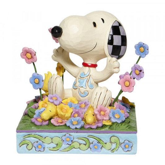 Snoopy in bed of Flowers Figurine By Jim Shore