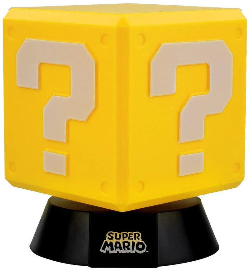 The Super Mario Bros. Question Block 3D Light by Paladone features a yellow cube with white question marks on a black base, perfectly capturing the iconic look from the beloved video game series.