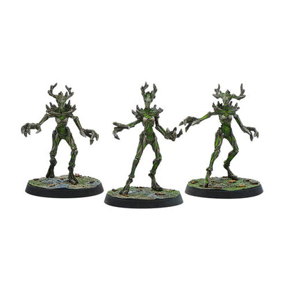Three painted The Elder Scrolls Call To Arms Spriggans miniatures by Modiphius stand on round bases against a white background.